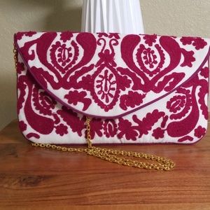 Fuschia embroidered clutch